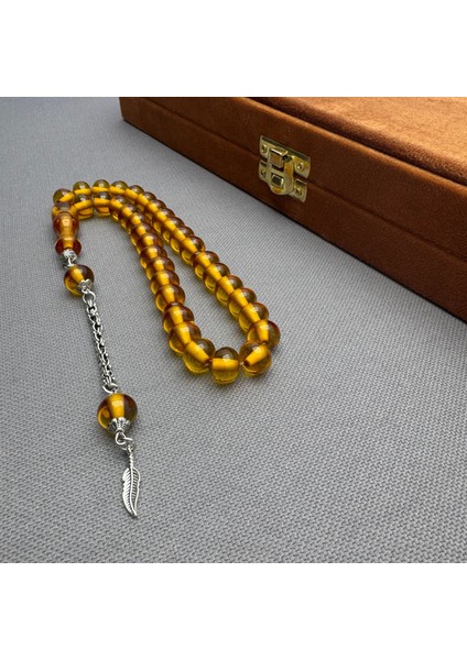 Alpaka Püsküllü Sarı Bilek Boy Sıkma Kehribar Tespih fırsatları