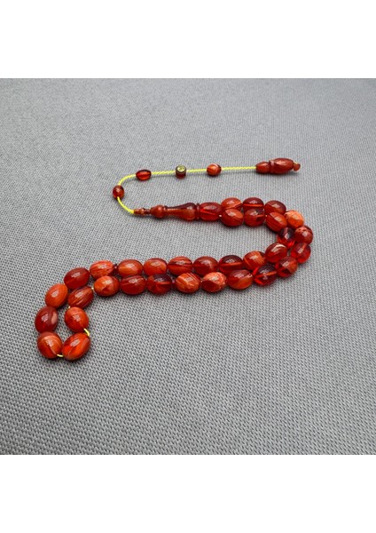 Ahmet Eryılmaz Usta Işçilikli Mercan Renkli Yoğun Hareli Sıkma Kehribar Tespih modelleri