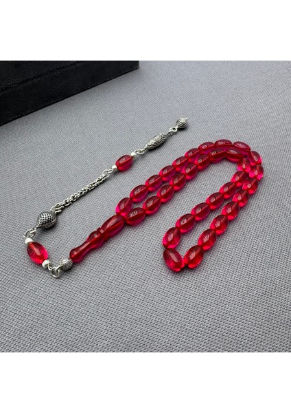 Alpaka Püsküllü Pembe Sıkma Kehribar Tespih modelleri