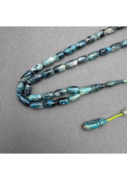 Usta Işçilikli Okyanus Mavisi Yorun Dalga Hareli Sıkma Kehribar Tespih fiyatları