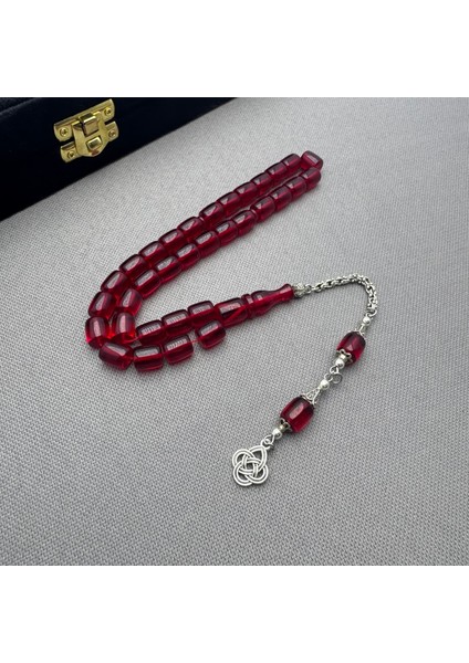 Alpaka Püsküllü Koyu Kırmızı Kapsül Kesim Sıkma Kehribar Tespih