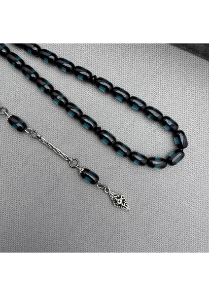 Alpaka Püsküllü Petrol Yeşil Şeffaf Renk Sürmeli Model Sıkma Kehribar Tespih fiyatları