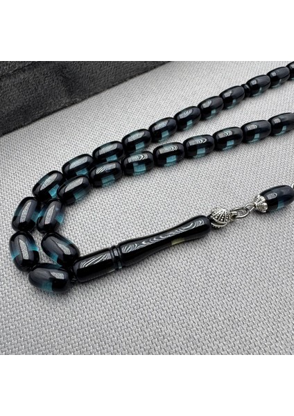 Alpaka Püsküllü Petrol Yeşil Şeffaf Renk Sürmeli Model Sıkma Kehribar Tespih indirimleri