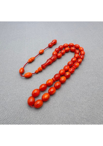 Usta Işçilikli Yoğun Hareli Mercan Renk Sıkma Kehribar Tespih modelleri