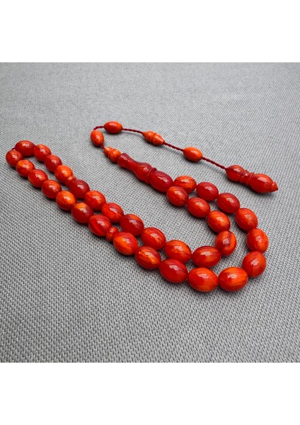 Usta Işçilikli Yoğun Hareli Mercan Renk Sıkma Kehribar Tespih fırsatları