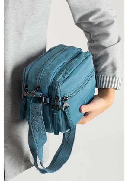 Yumuşak Dokulu Ultra Hafif, Esnek ve Su Geçirmez Polyamid Kumaş Omuz Çantası Mavi Model: (571-13-14E) modelleri