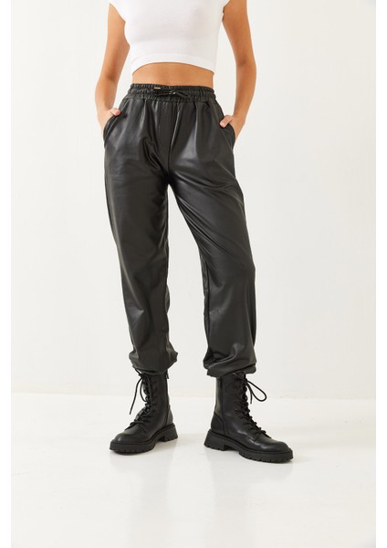 Kadın Bel ve Paça Lastikli Deri Pantolon indirimleri