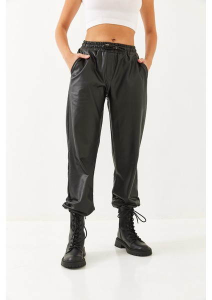 Kadın Bel ve Paça Lastikli Deri Pantolon