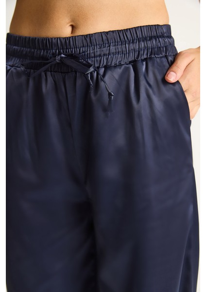 Kadın Yüksek Bel Beli Lastikli Saten Bol Paça Pantolon
