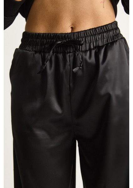 Kadın Yüksek Bel Beli Lastikli Saten Bol Paça Pantolon