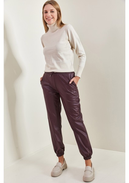 Kadın Bel ve Paça Lastikli Deri Pantolon modelleri