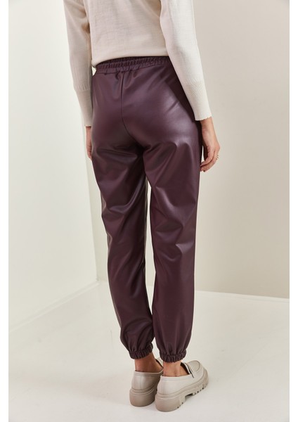 Kadın Bel ve Paça Lastikli Deri Pantolon fırsatları