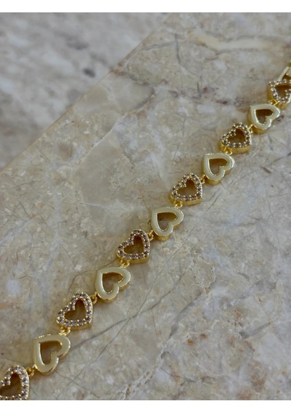 Çelik Kalp Sıralı Taşlı Gold Bileklik modelleri