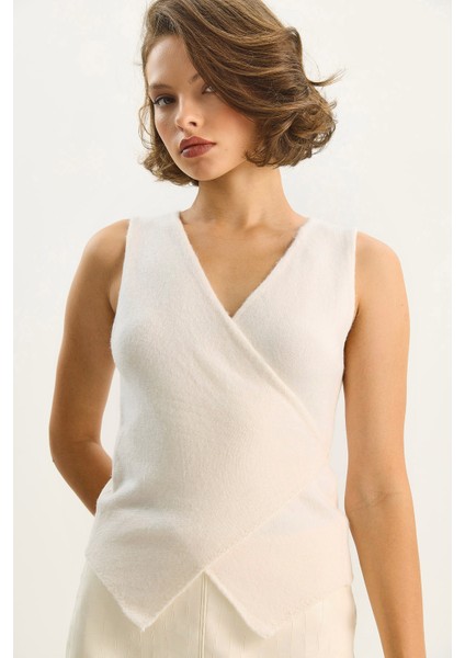 Kadın Kruvaze Yaka Bel Bağlamalı Triko Yelek indirimleri