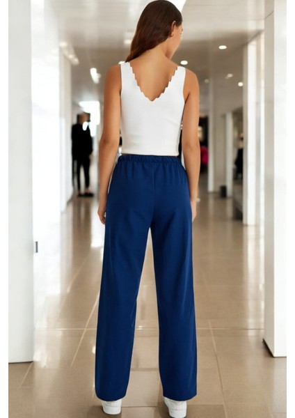 Yazlık Beli Bağcık Detaylı Keten Pantolon fiyatları