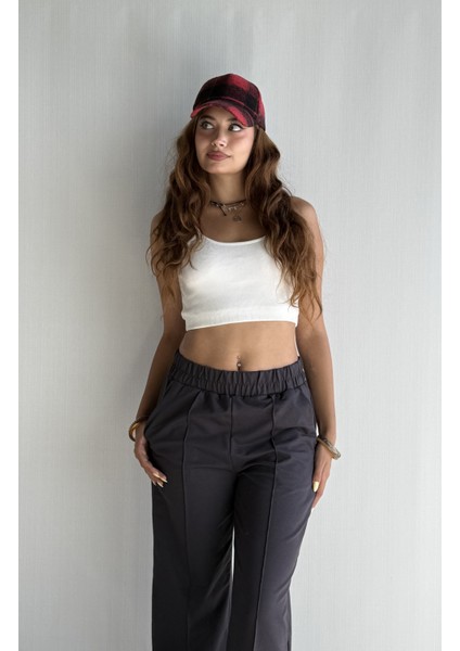 Kadın Lastikli Yüksek Bel Yırtmaçlı Bol Paça Pantolon fiyatları