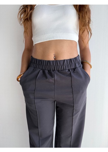 Kadın Lastikli Yüksek Bel Yırtmaçlı Bol Paça Pantolon modelleri