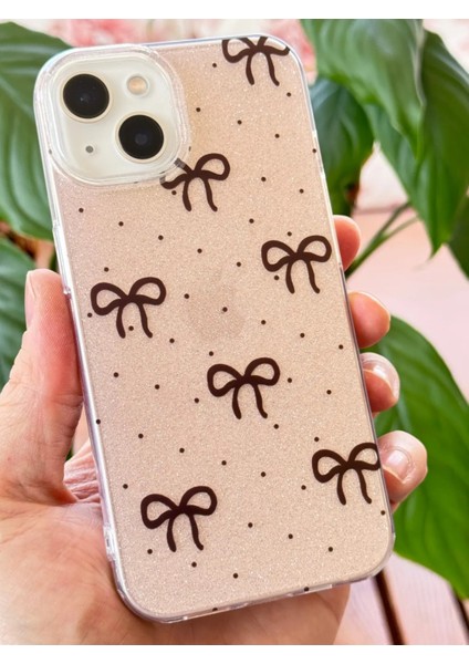 Apple iPhone 13/14 Uyumlu Kılıf Simli Siyah Fiyonk Desenli Renkli Parlak Darbe Emici Kapak modelleri