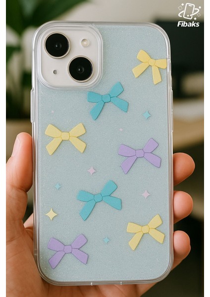 Apple iPhone 13/14 Uyumlu Kılıf Mavi Simli Renkli Fiyonk Desenli Parlak Darbe Emici Kapak modelleri