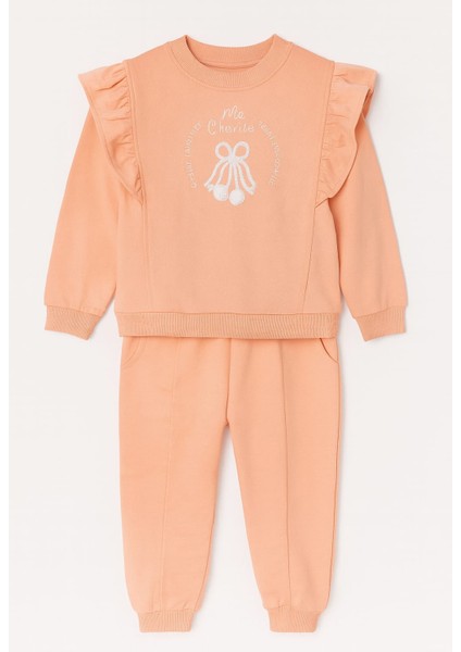 Kız Çocuk 2’li Eşofman Takımı – Fırfır Detaylı Üst, Şeftali Renk, Mevsimlik Rahat Kumaş | Kr Kids Boutique fiyatları