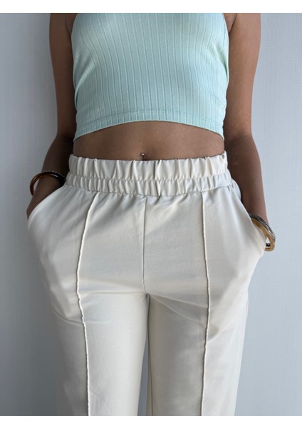 Kadın Lastikli Yüksek Bel Yırtmaçlı Bol Paça Pantolon modelleri