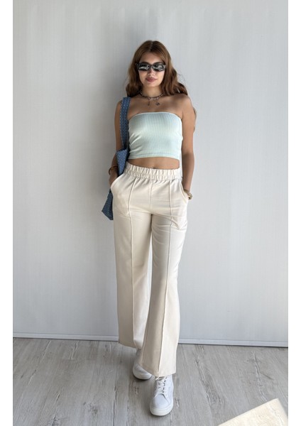 Kadın Lastikli Yüksek Bel Yırtmaçlı Bol Paça Pantolon indirimleri