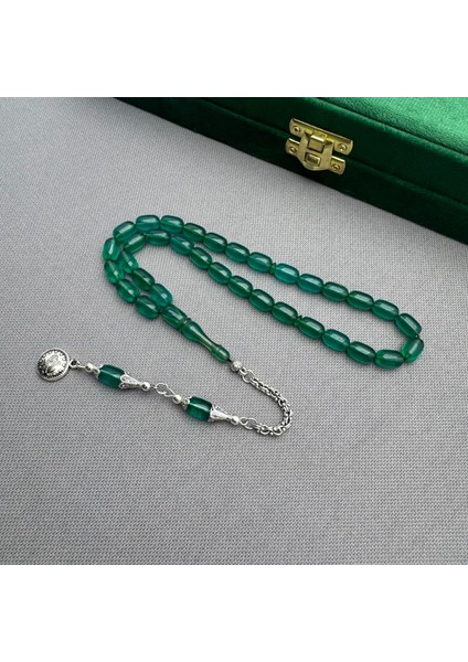 Alpaka Püsküllü Yeşil Renk Kapsül Kesim Sıkma Kehribar Tespih indirimleri