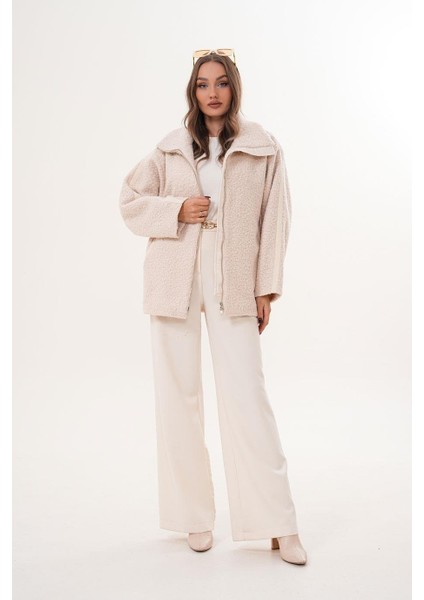 Ön Fermuarlı Biyeli Uzun Kıvırcık Krem Mont SRP1200 modelleri