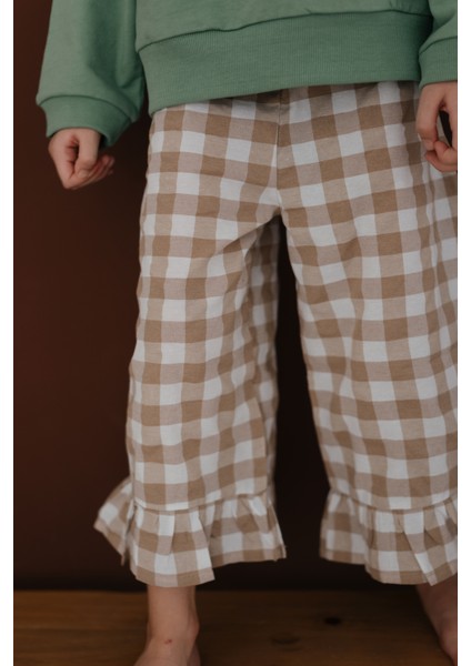 Mabel Krem Beyaz Ekoseli Fırfırlı Geniş Paça Pantolon fırsatları