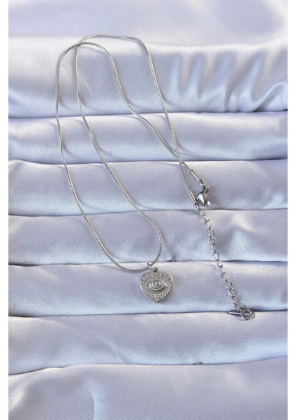 316L Gümüş Renk Zirkon Taşlı Işlemeli Göz Detay Kalp Kolye fiyatları