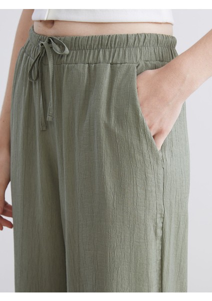 Yeni Sezon Beli Lastikli Dokulu Geniş Paça Kadın Pantolon modelleri