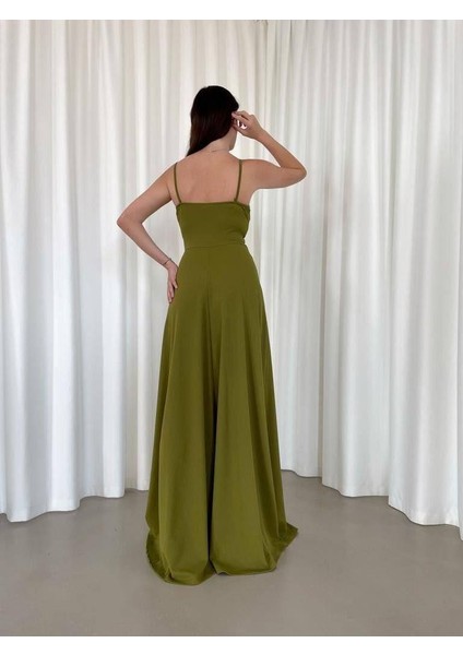 Esnek Kumaş Ip Askılı Yırtmaç Detaylı Uzun Abiye ve Mezuniyet Elbisesi Fıstık Yeşil 582189 fırsatları