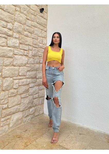 Yırtık Eskitilmiş Detaylı Dar Paça Kot Pantolon modelleri