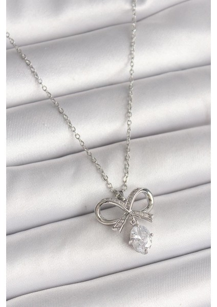 Çelik Zirkon Taşlı Kurdele Modelli Kolye