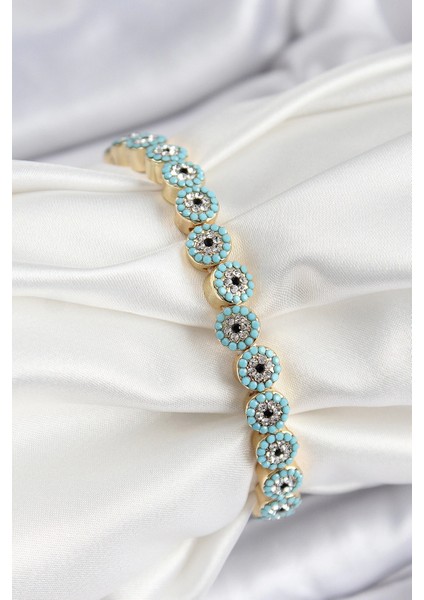 Pirinç Zirkon Taşlı Turkuaz Nazar Model Gold Renk Lastikli Kadın Bileklik