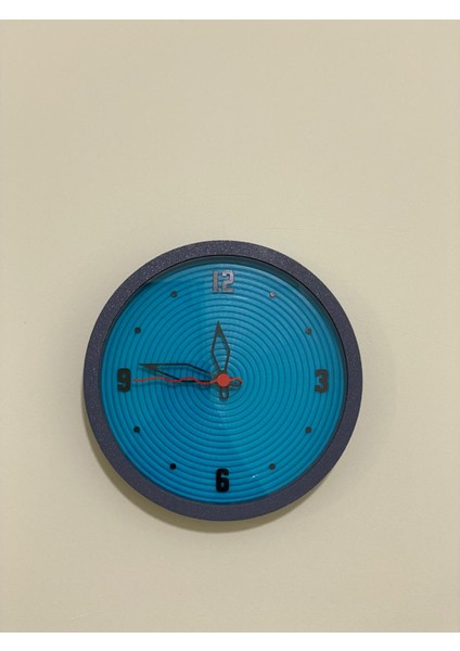 Mavi Spiral Tasarımlı, Koyu Gri Kasa, Sade ve Modern Duvar Saati