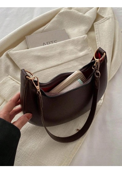 Modern Şıklığın Zarif Dokunuşu: Minimal Omuz Çanta fiyatları