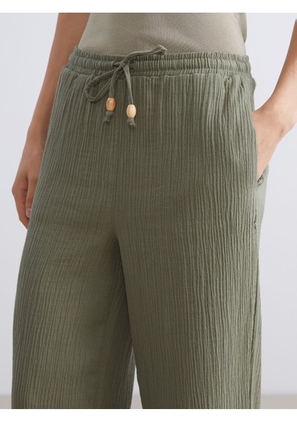 Yeni Sezon Büyük Beden Beli Lastikli Dokulu Müslin Kadın Pantolon indirimleri