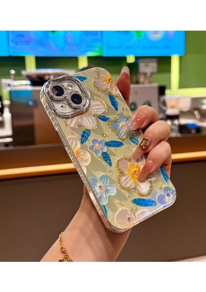 iPhone 15 Kılıf Renk Geçişli Taşlı Kamera Lens Korumalı Simli Yeşil Çiçek Desenli Darbe Emici Kapak