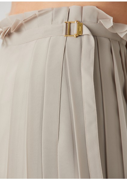 Bej Pileli Maksi Etek indirimleri