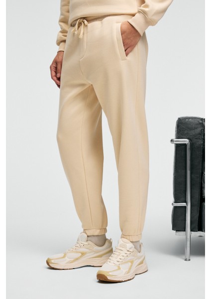 ANSEL Erkek Lastikli Dar Paça Üç Cepli Yumuşacık Organik Pamuklu Vanilya Eşofman Altı modelleri