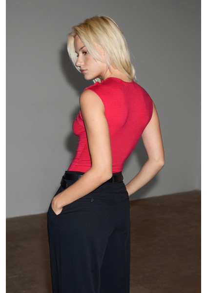 ORILENNA Kadın Önü Düğüm Detaylı Vücudu Saran Sıfır Kollu Slim Fit Fuşya Bluz