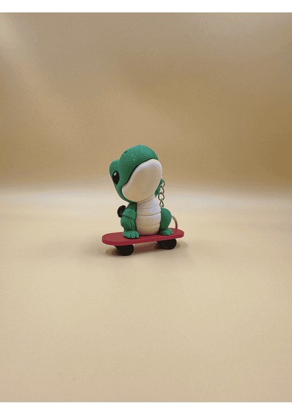 Yeşil Kırmızı Kaykaylı Dino Anahtarlık / Verslab Print