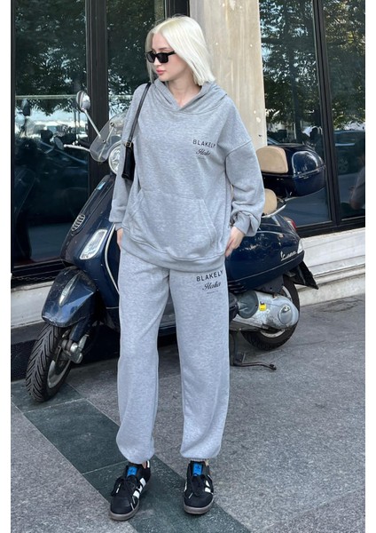 Grimelanj Kapüşonlu Sırt Baskılı Kadın Eşofman Takımı MG2187 indirimleri