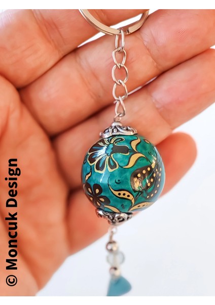 Yeşil Sıcak Hava Balonu Şeklinde Üzeri Çiçek Desenli Uç Kısmı Zincir Süslemeli Anahtarlık indirimleri