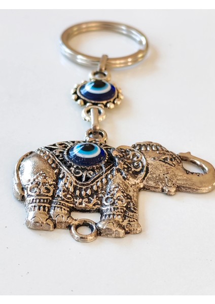 Metal Fil Şekilli Üzeri Cam Göz Süslemeli Ince Işlemeli Anahtarlık fiyatları