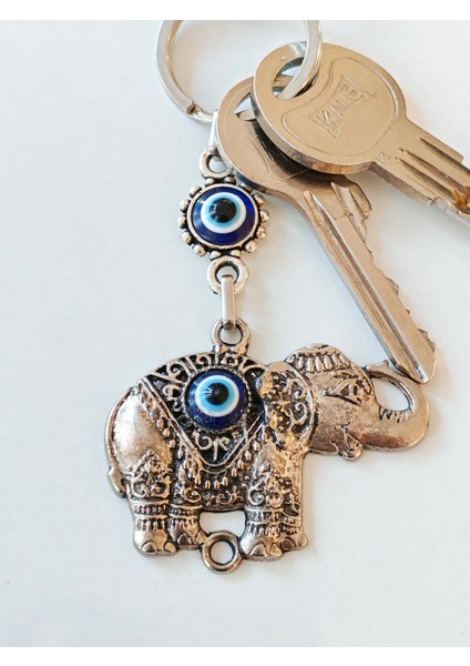 Metal Fil Şekilli Üzeri Cam Göz Süslemeli Ince Işlemeli Anahtarlık modelleri