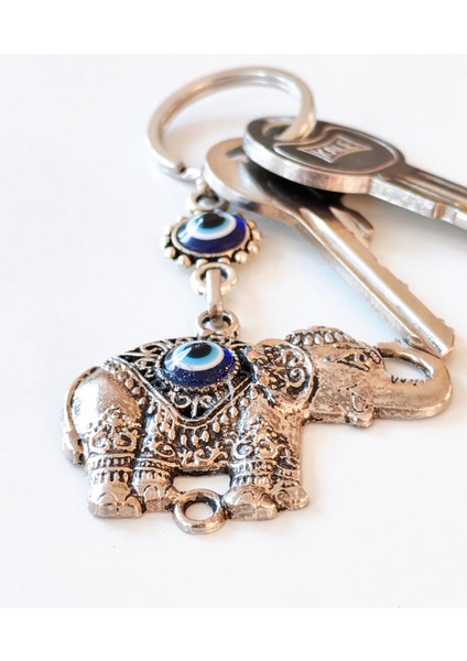 Metal Fil Şekilli Üzeri Cam Göz Süslemeli Ince Işlemeli Anahtarlık fırsatları