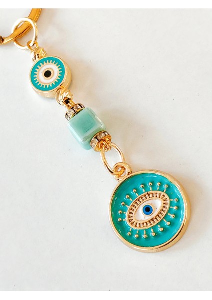 Sarı Metal Içi Turkuaz Mavi Göz Desenli Anahtarlık modelleri