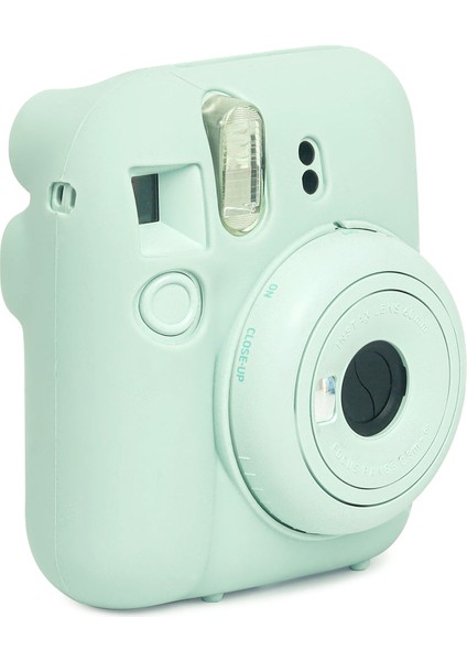 Instax Mini 12 Yeşil Fotoğraf Makinesi + 10'lu Film Kıskaçlı Stand Mini Albüm ve Silikon Kılıf Seti